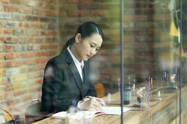 Woman working at cafe