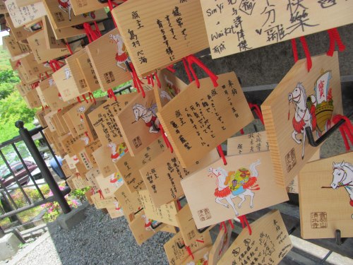 Ema boards at a shrine in Kyoto. Horses were believed to be messengers of the kami and could deliver the mortals’ wishes to the immortals themselves. Other animals, like those from the zodiac, are common as well. Since 2019 is the Year of the Boar, there will probably be lots of ema depicting boars.
