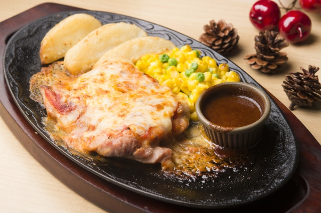 Baked chicken with cheese at a family restaurant. 