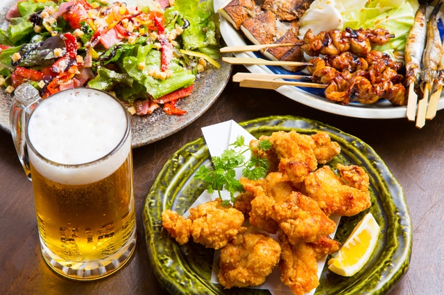 Izakaya food - fried chicken, kushiyaki, beer