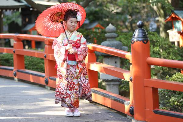 A 7 year old girl dressed to commemorate her 7th birthday.