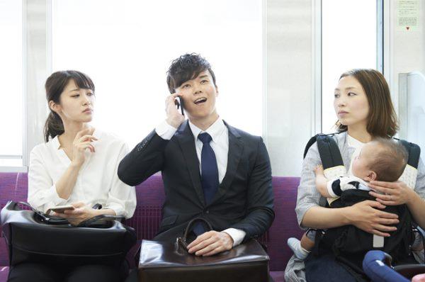 Main talking loudly on train