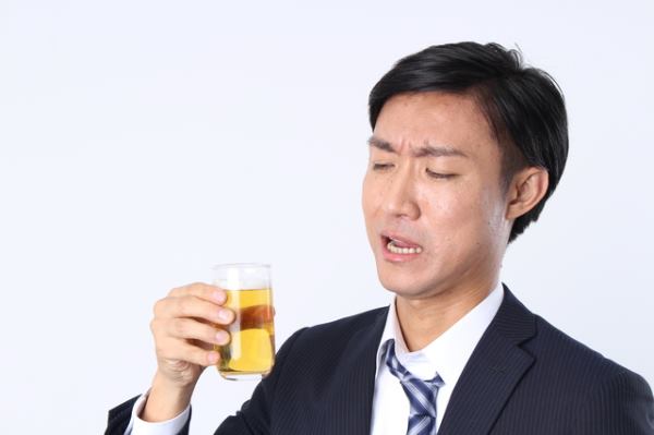 Man not wanting to drink beer