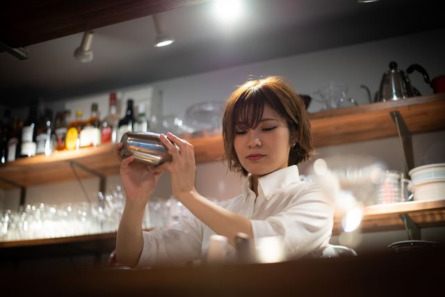 Bartender making a sake cocktail