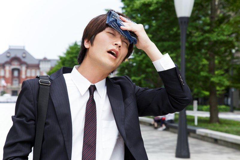 Businessman sweating in the summer