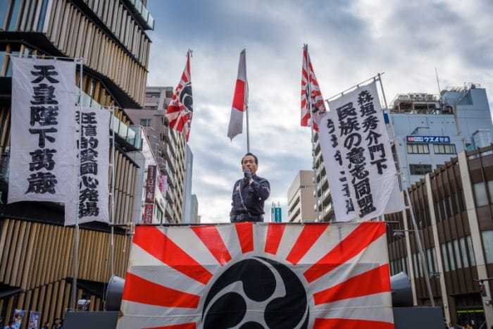 A right wing speaker gives a public address in the Asakusa district.