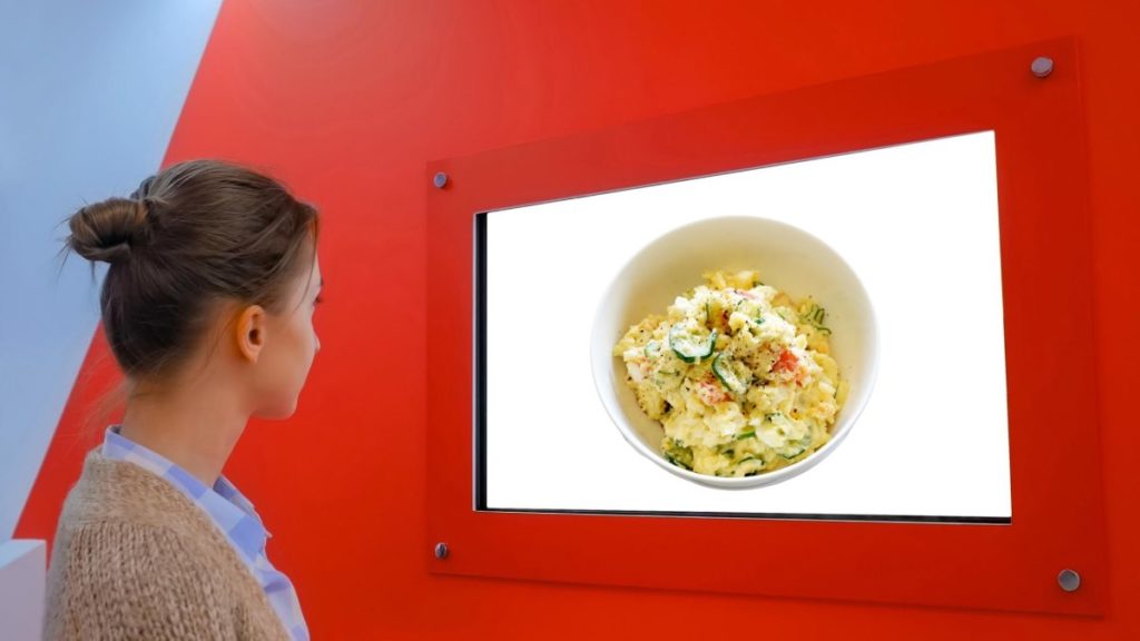 Woman looking at potato salad