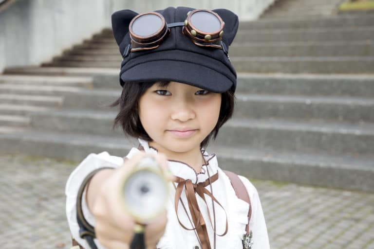 Girl with toy gun
