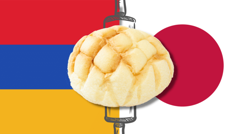 A melonpan atop the flags of Armenia and Japan.