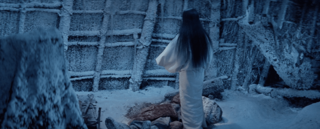 The Snow Woman of Kwaidan stands over her prey.