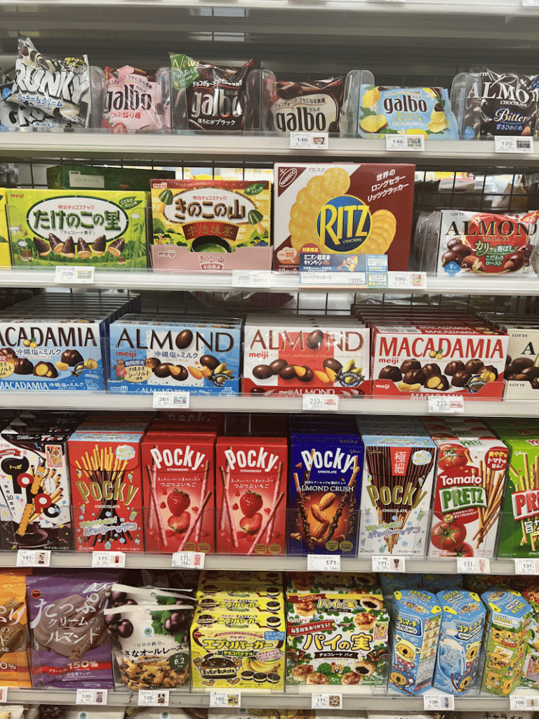 Pocky Day - an assortment of Pocky on a shelf in a Japanese convenience store.