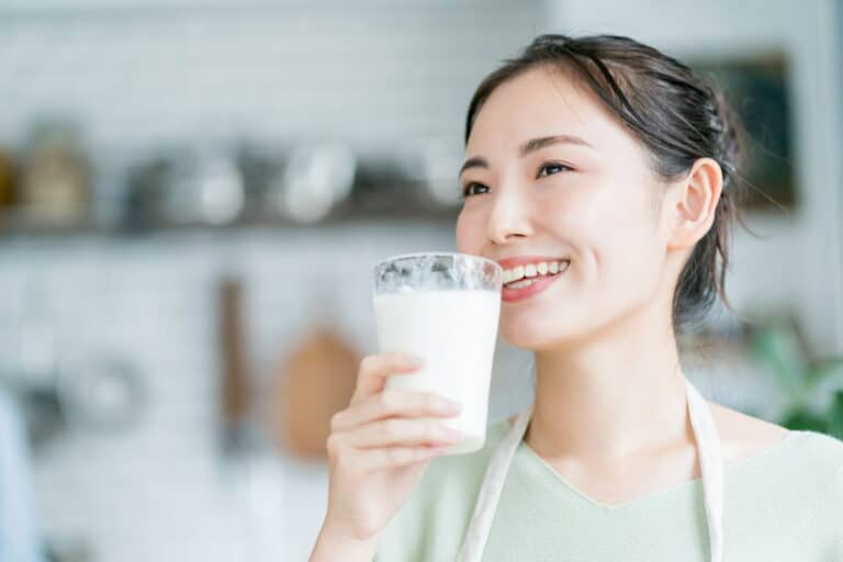 Woman consuming milk