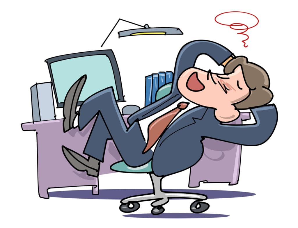 A simple illustration representing "saboru" as the salaryman slacks off at his desk.