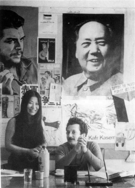 Shigenobu Fusako and PFLP spokesman Ghassan Kanafani, with posters of Mao in background.