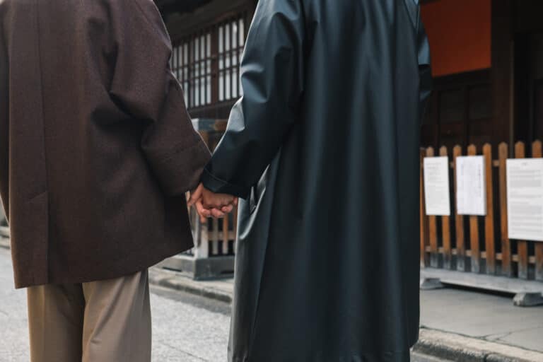 Men holding hands