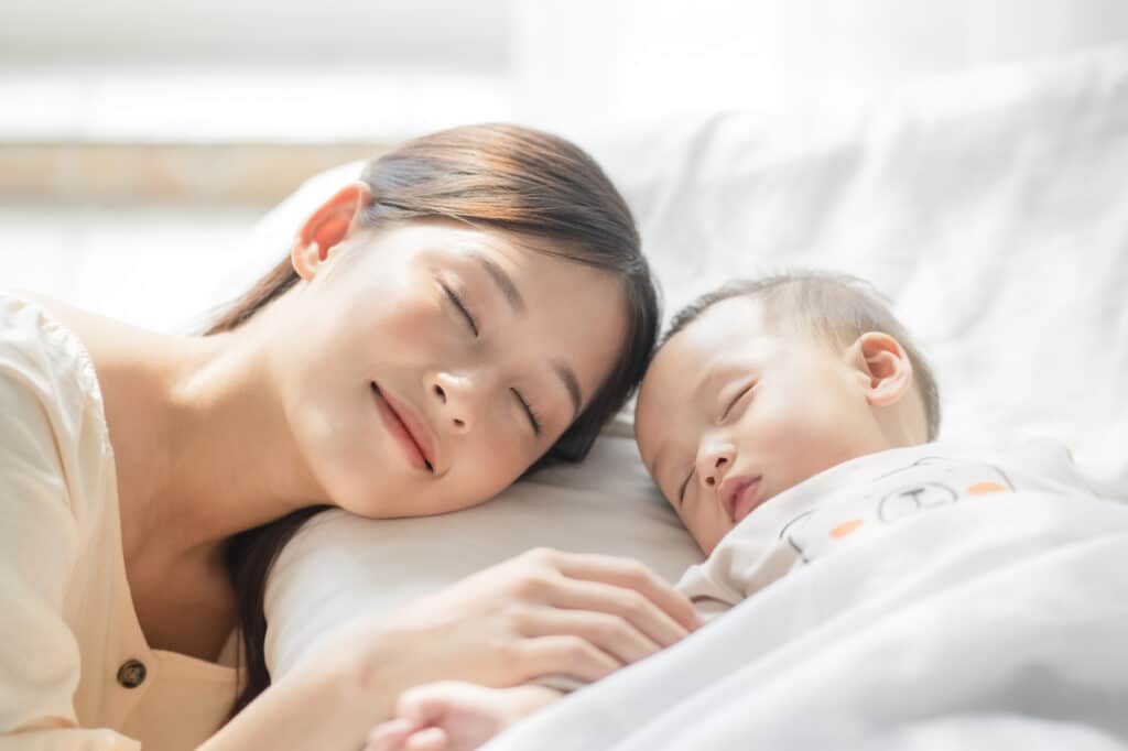 Mom resting with her baby