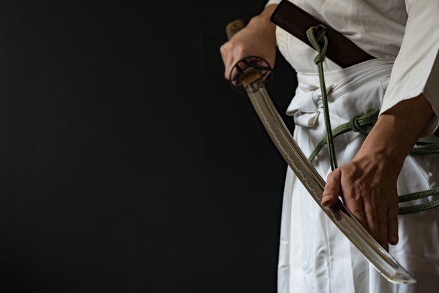 Man holding katana