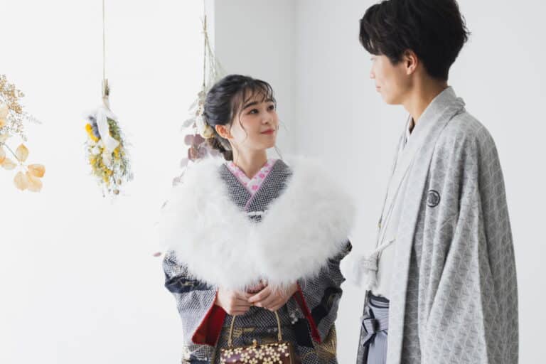 Man and woman in Coming of Age attire