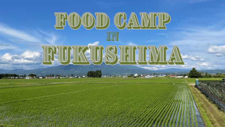 Image of green ricefields under a blue sky in Fukushima, with the text "food camp in Fukushima" superimposed.
