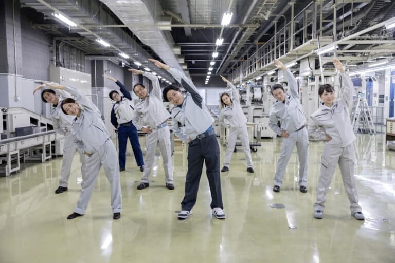People performing radio taiso in a factory