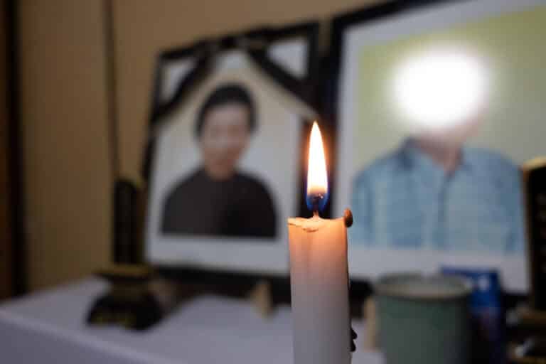 Couple pictured on Buddhist altar