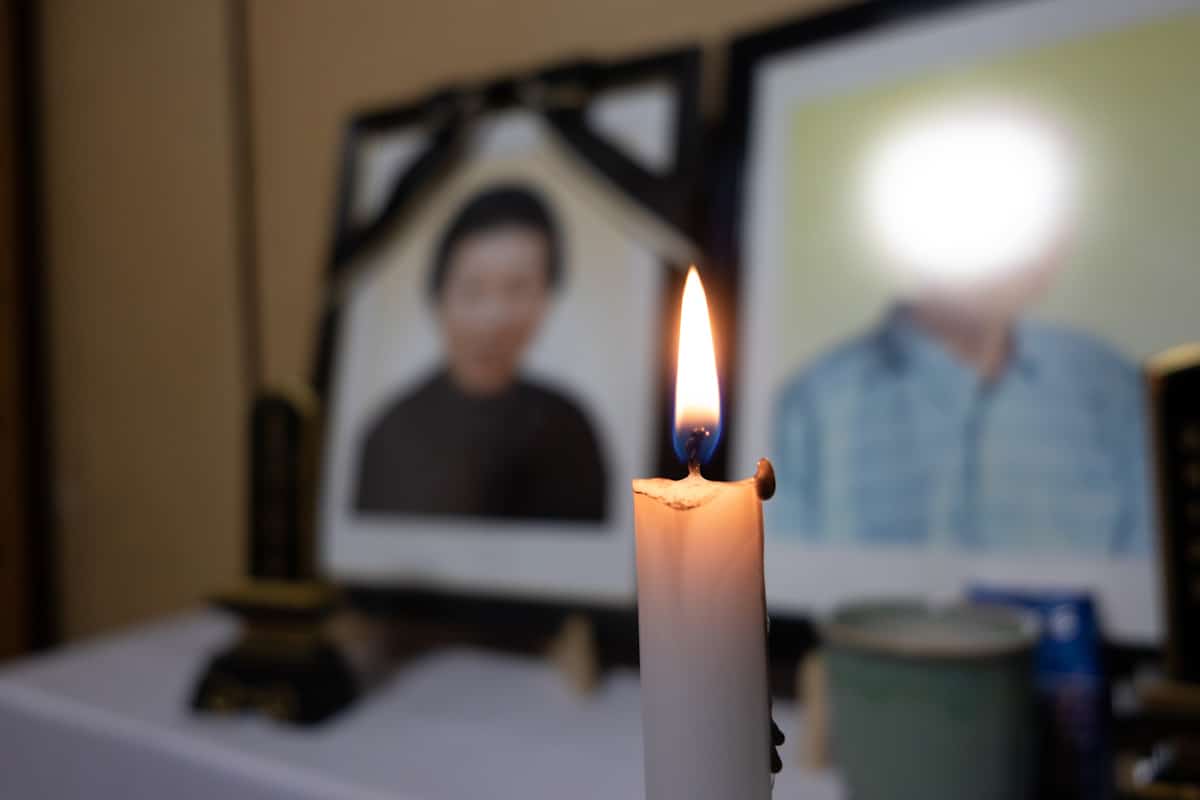 Couple pictured on Buddhist altar