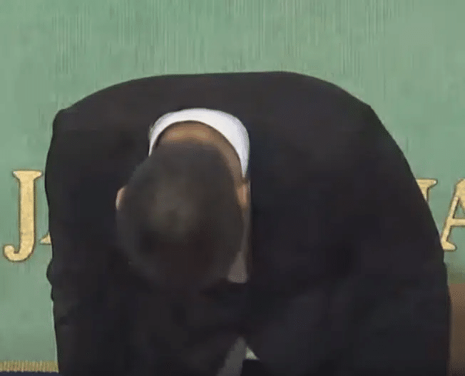 Nihon University player Miyagawa Daisuke apologizes for committing an after-snap tackle.