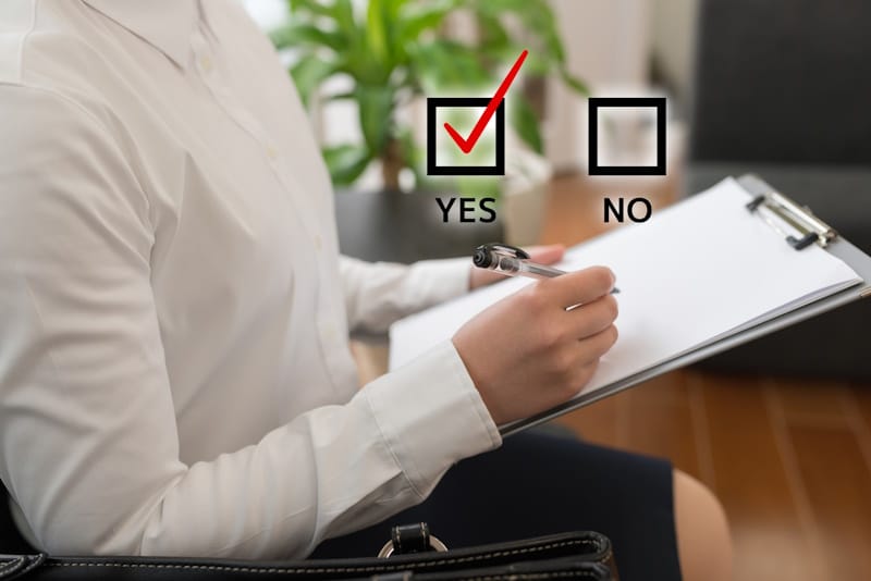 Woman checkling a contract