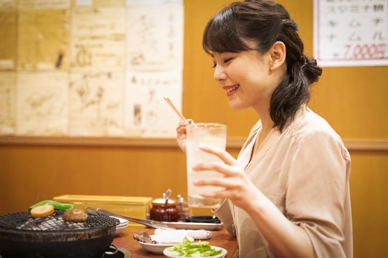 Woman eating by herself - being alone in Tokyo story