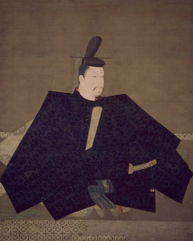 Minamoto no Yoritomo in black flowing robes, seated on tatami. 