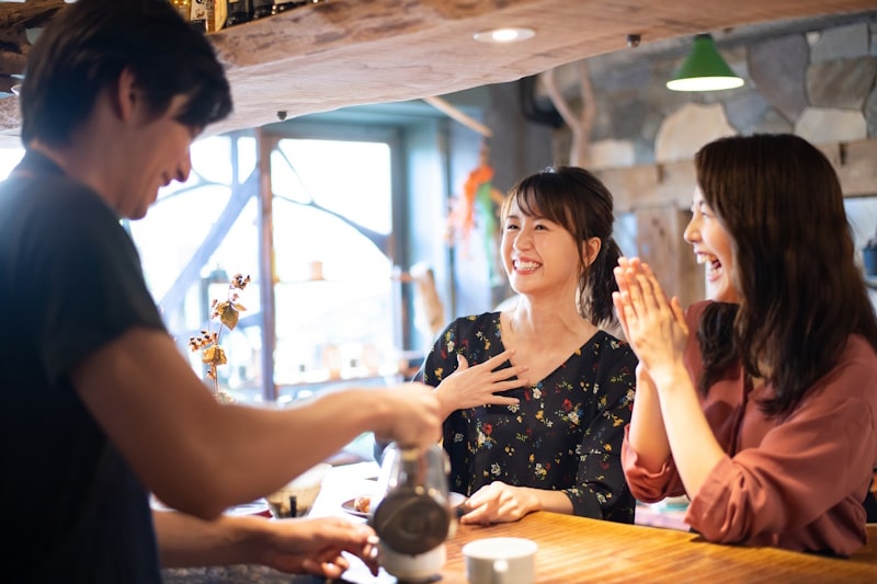 Customers enjoying themselves at a coffee shop