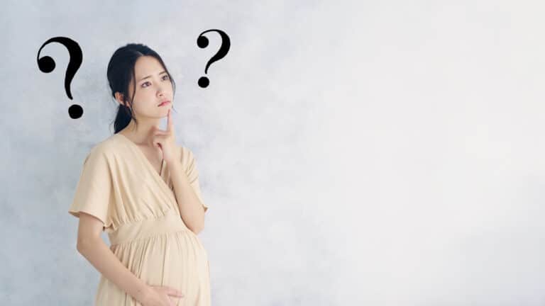Woman questioning herself while pregnant