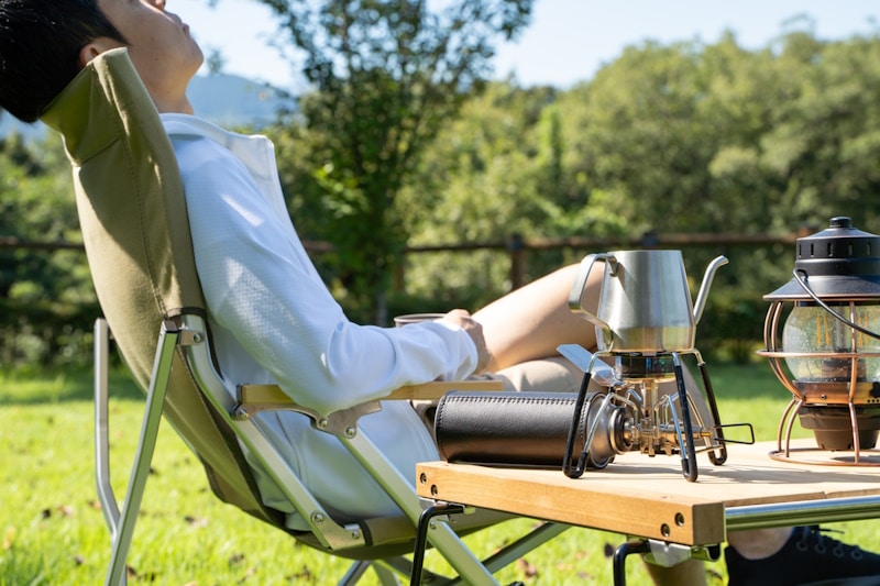 Man relaxing with coffee outdoors