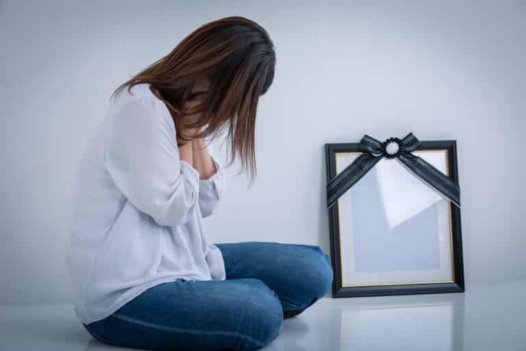Woman grieving the loss of a loved one