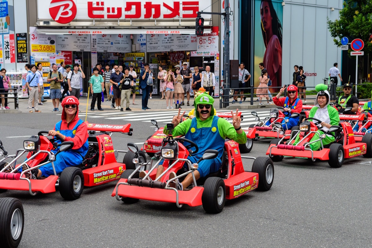 People riding stret karts (so-called "Mario karts") in Tokyo