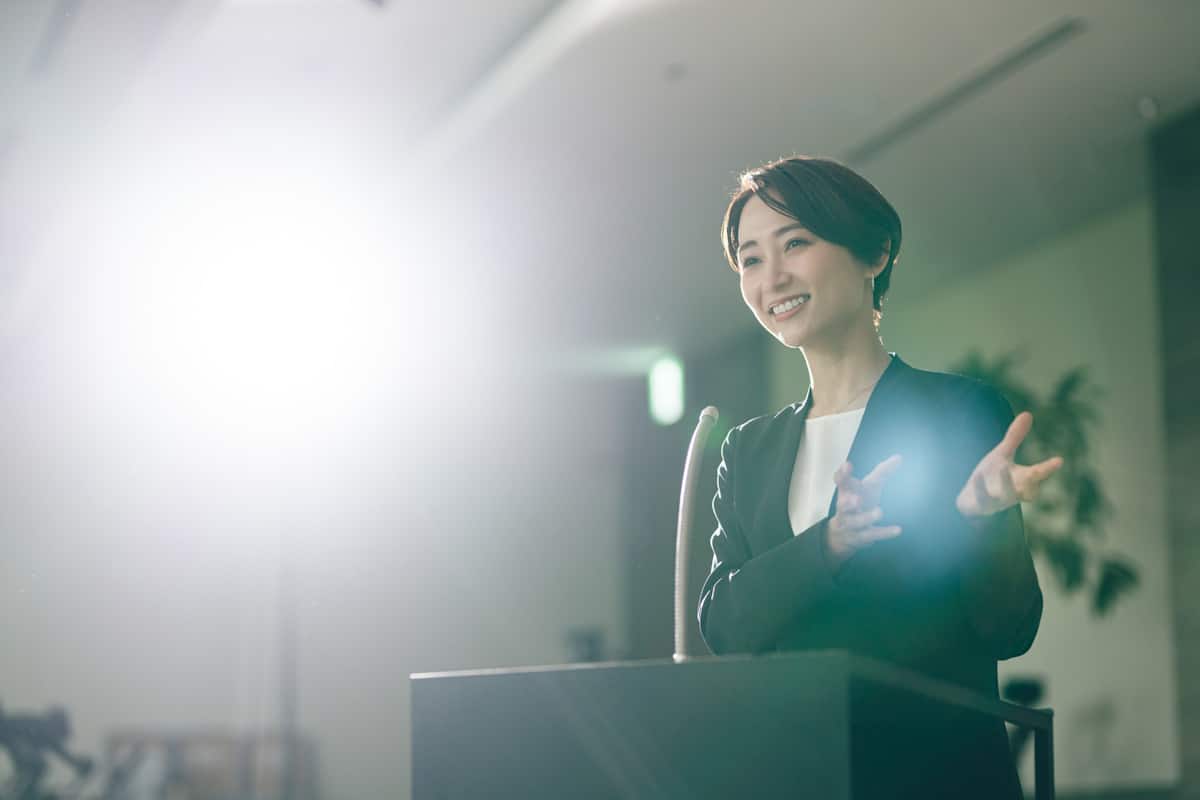 Woman speaking at podium