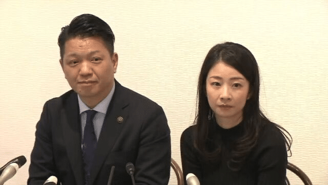 Nagano Kohei with his wife at a press conference
