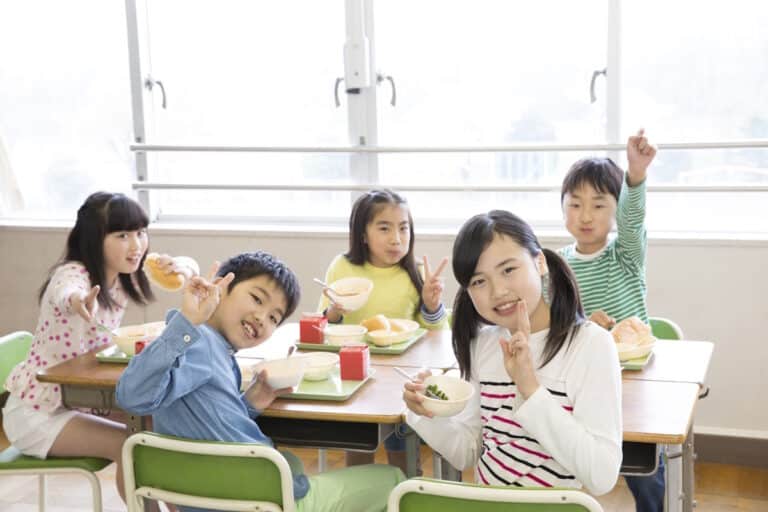 Kids having school lunches