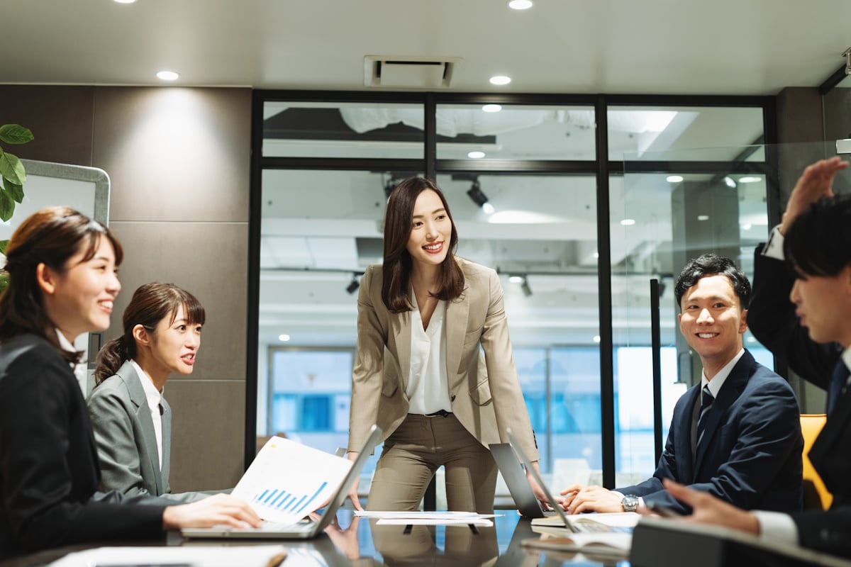 Female CEO leading meeting