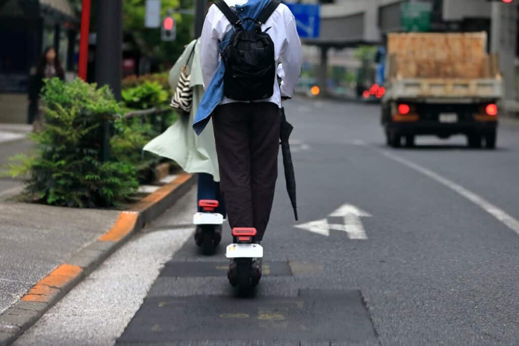 E-scooter rider on the road