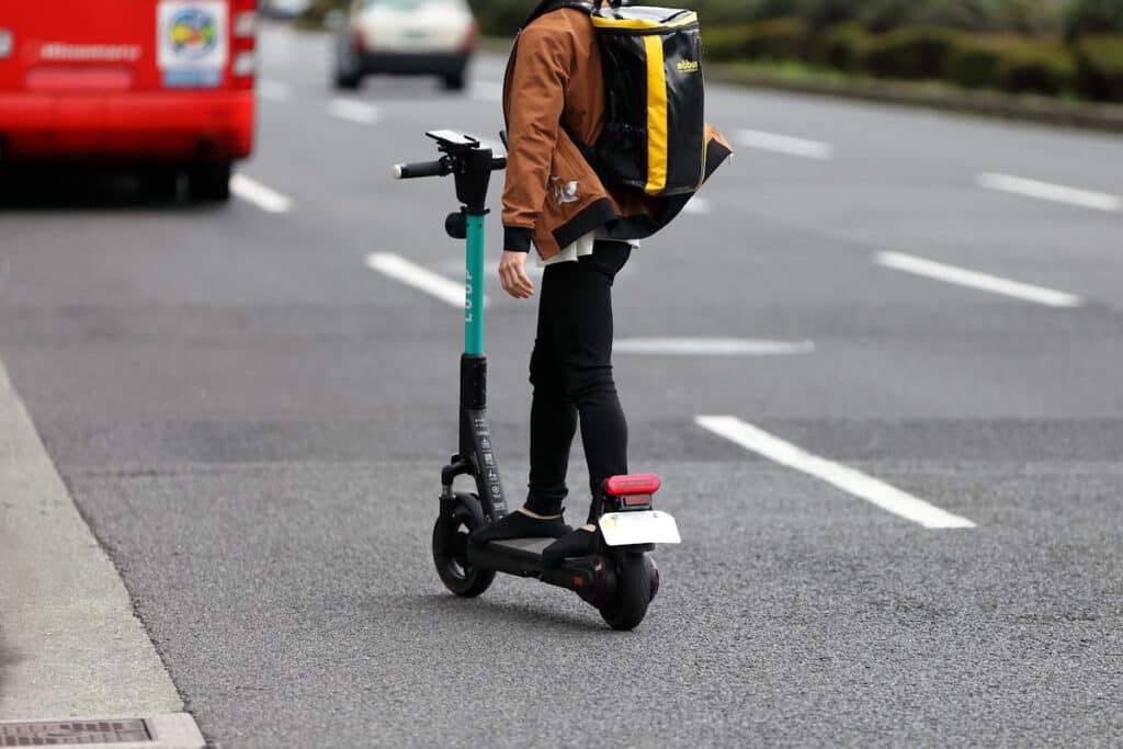 Guy on e-scooter
