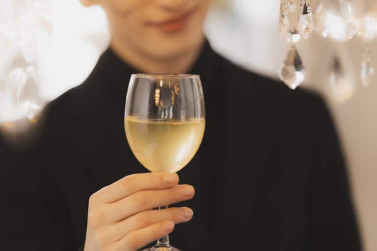 Host in a host club sipping champagne