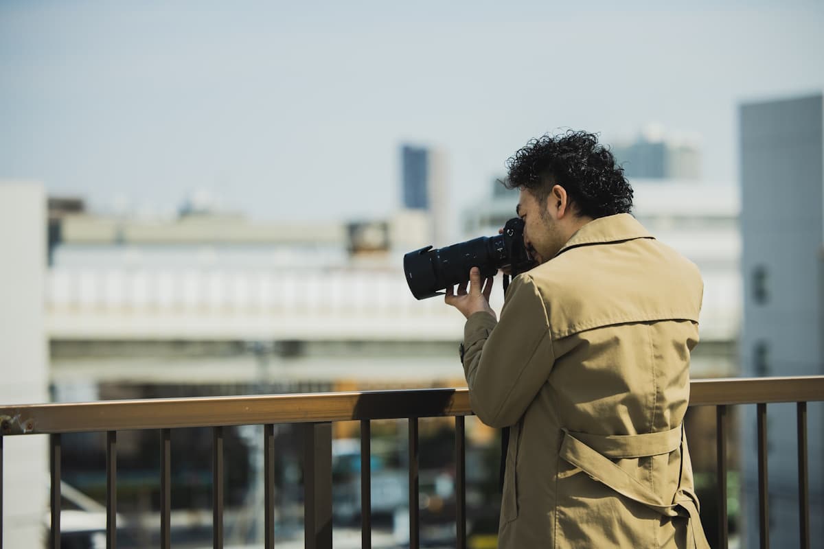Man taking photos from far away