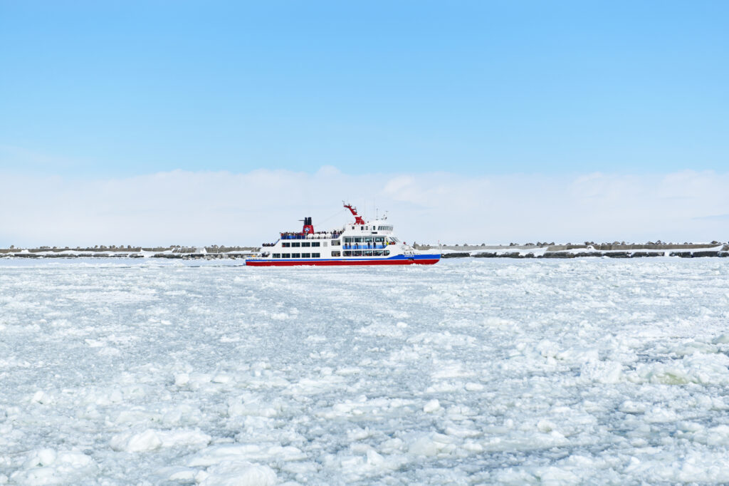 Tour boat Aurora sailing through the ice flows of Abashiri, Hokkaido
