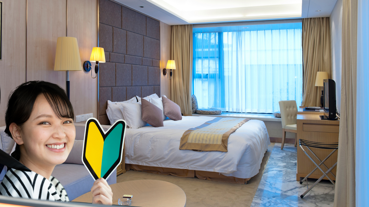 Driver's license while staying in hotel room - pictrure of woman in a car showing beginning driver's sticker superimposed against the picture of an inside of a hotel room