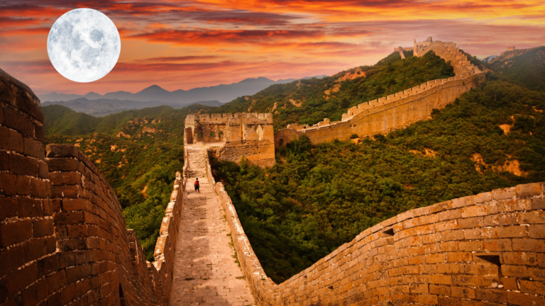 Great Wall of China with a picture of the moon in the upper left hand corner