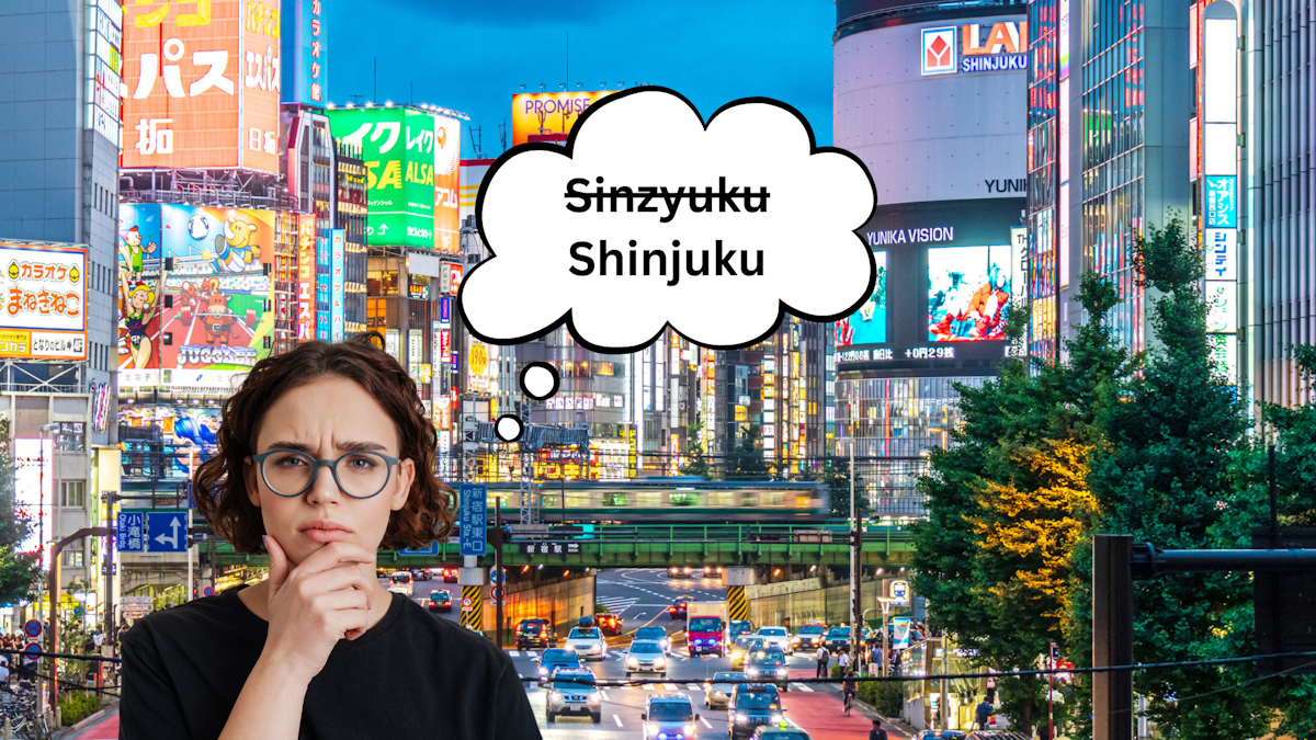 Hepburn Romanization- woman in front of a picture of downtown Shinjuku thinking it could be spelled "Sinzyuku" but changing her mind