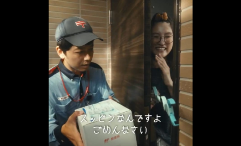 Japan Post ad - man tries delivering a box to a woman with no makeup on; she refuses to open the door all the way