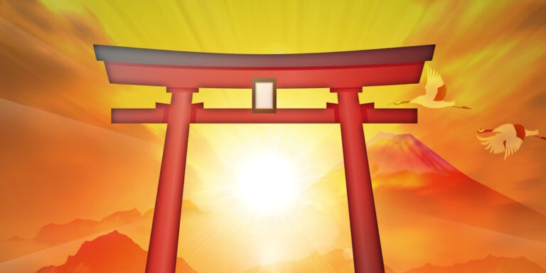 Torii gate with a mountain looming in the background and sun rays shining through
