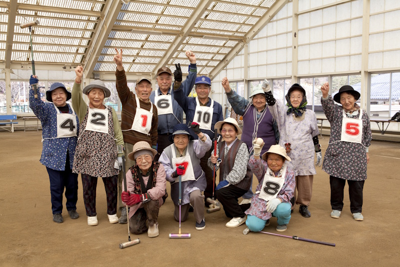 A group of senior citizens divided into two gateball teams